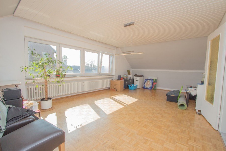 Das Wohnzimmer Dachgeschosswohnung Korschenbroich / Kleinenbroich