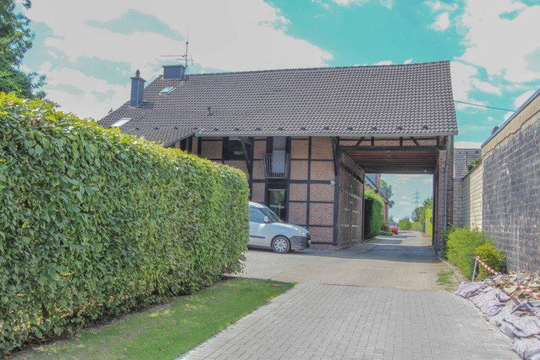 Die Au�enansicht Korschenbroich Erdgeschosswohnung Sanierte Erdgeschosswohnung mit Garten in ruhiger Lage von Korschenbroich