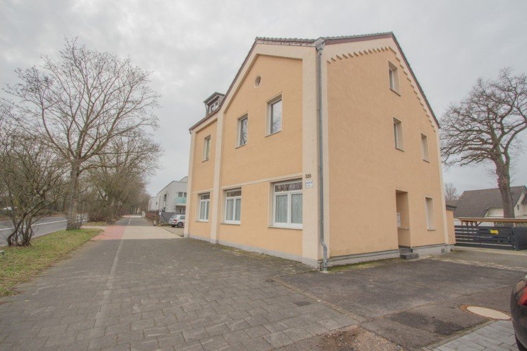 Au�enansicht Neuss Erdgeschosswohnung Ger�umige Zwei-Zimmer Wohnung mit optionalem Stellplatz in begehrter Lage von Neuss-Vogelsang